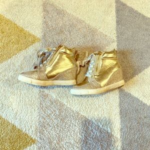 Stuart Weizmann girls wedge sneakers.